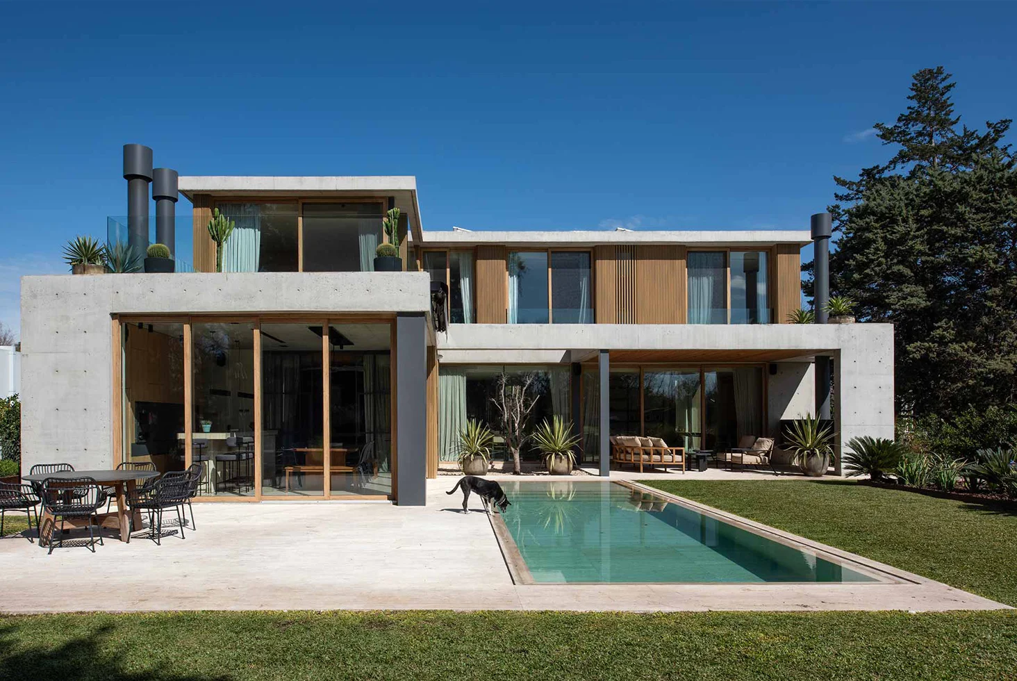 Casa Maui residential backyard with pool and terrace.